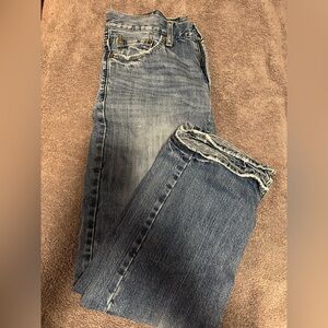 American Eagle Outfitters Blue Relaxed Jeans with Distressed Hem
